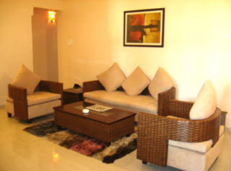 Hotel The Elite Suites Pune Quarto foto