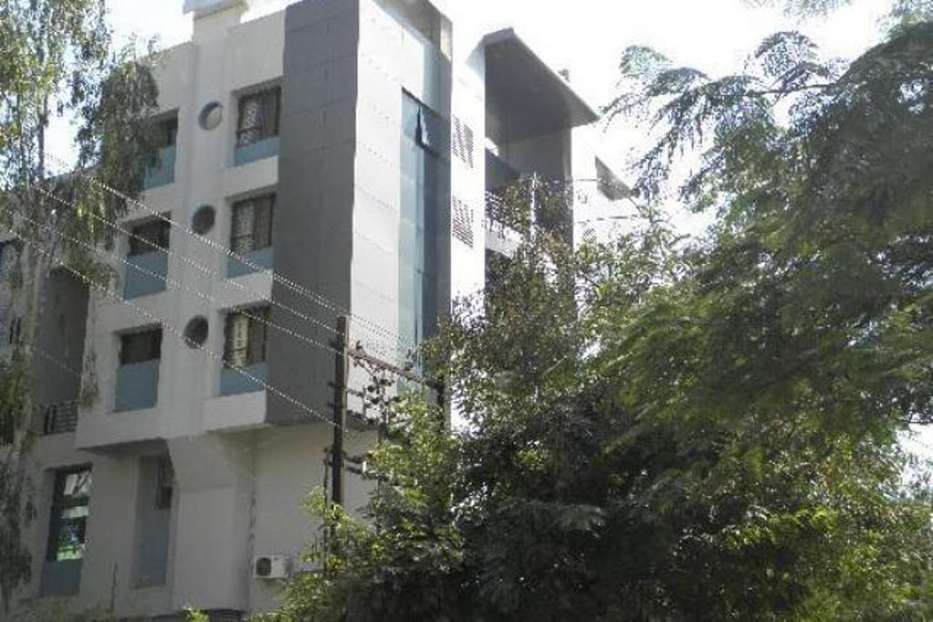 Hotel The Elite Suites Pune Quarto foto