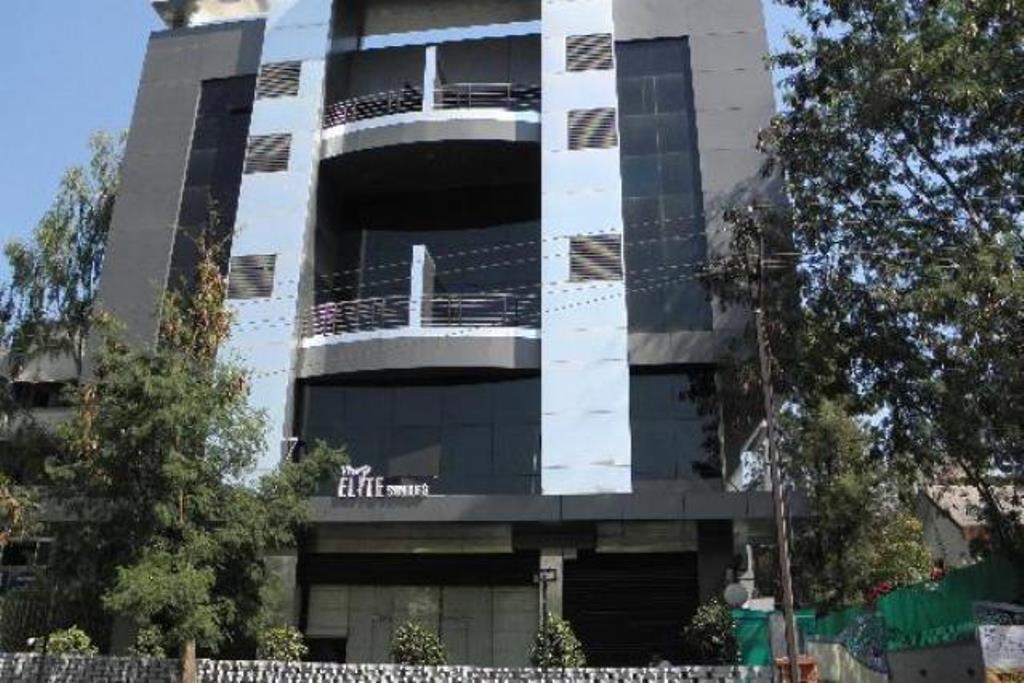 Hotel The Elite Suites Pune Quarto foto