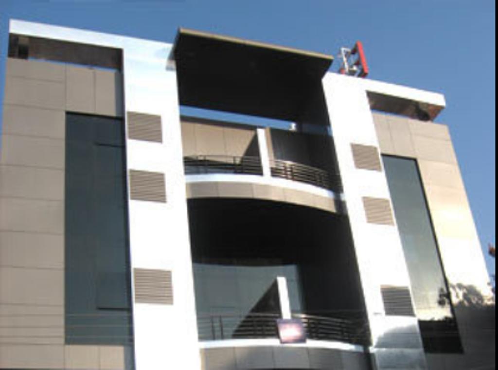 Hotel The Elite Suites Pune Quarto foto