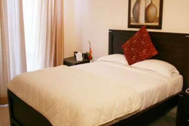 Hotel The Elite Suites Pune Quarto foto