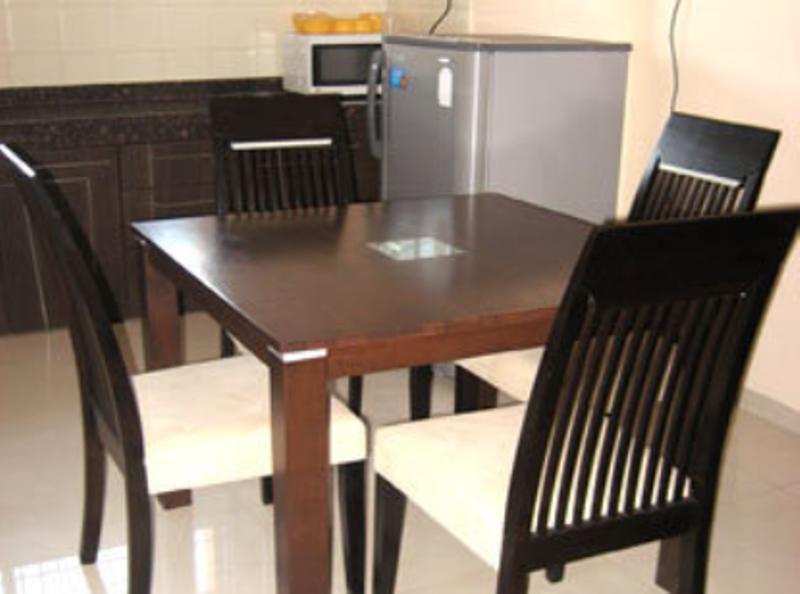 Hotel The Elite Suites Pune Quarto foto