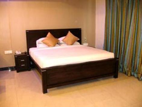 Hotel The Elite Suites Pune Quarto foto